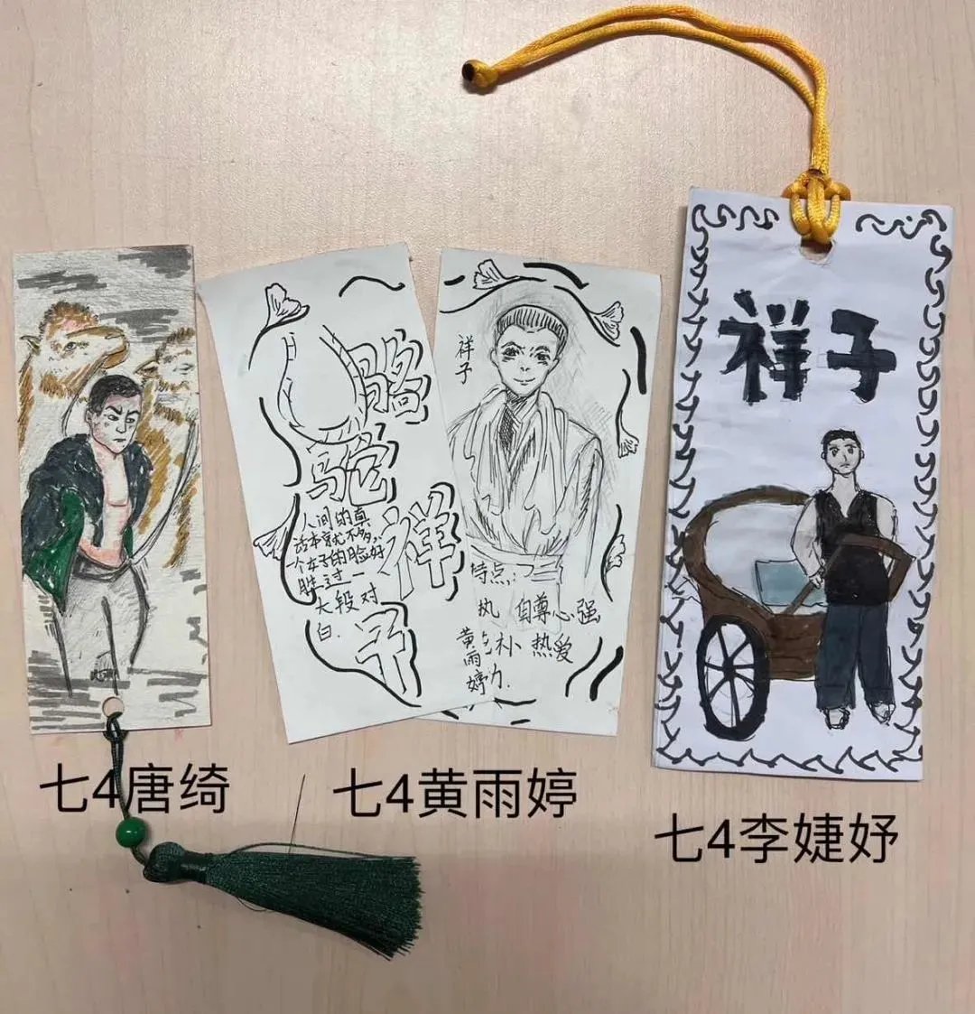 七年级同学从两本必读名著《骆驼祥子》,《海底两万里》,或者选择自己